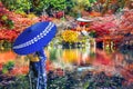 Asian woman wearing japanese traditional kimono in Daigoji temple, Kyoto. Japan autumn seasons.