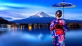 Asian woman wearing japanese traditional kimono at Fuji mountain, Kawaguchiko lake in Japan Royalty Free Stock Photo