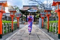 Asian woman wearing japanese traditional kimono at Kyoto temple in Japan. Royalty Free Stock Photo