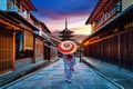 Asian woman wearing japanese traditional kimono at Yasaka Pagoda and Sannen Zaka Street in Kyoto, Japan. Royalty Free Stock Photo