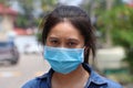 Asian woman wearing the mask for prevent germs. Tiny Particle or Covid 19 protection. Concept of Combating illness Royalty Free Stock Photo