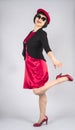 Asian Woman Wearing Red Satin Dress and Matching Red Beret Hat and Red Leather Pumps 2 Royalty Free Stock Photo