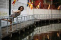 Woman wearing sunglasses on the river embankment.