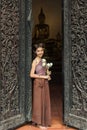 Asian woman wearing typical (Traditional) Thai dress in temple