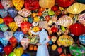 Asian woman wearing vietnam culture traditional and hoi an lanterns at Hoi An ancient town, Vietnam Royalty Free Stock Photo