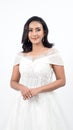 Asian woman in white wedding dress. Thai bride poses before the wedding day