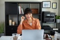 Asian woman work on computer laptop at home office. video call, studying, learning and working online Royalty Free Stock Photo