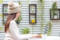 Asian women working on keyboard. Work space relaxing chill out work in the garden for office and design laptop smartphone with mor Royalty Free Stock Photo