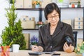 Asian woman working