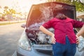 Women worry overheat trouble with car engine crash