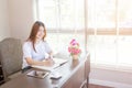 Asian woman writing book Royalty Free Stock Photo