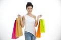 Asian women and Beautiful girl is holding shopping bags and using a smart phone and smiling while doing shopping and buy with Royalty Free Stock Photo