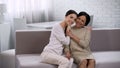 Asian women embracing, motherhood and grateful daughter, happy family meeting