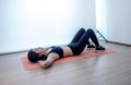 Asian women are exercising at studio. Abdominal exercises Sit up