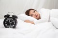 Asian women with feelings of helplessness and hopelessness on white bed in bedroom. Royalty Free Stock Photo