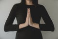Asian woman with hand in praying position,Female pay respect or put your hands together in a prayer position Royalty Free Stock Photo