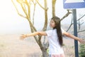 Asian women happily stood looking the mountains