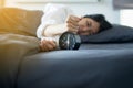 Asian women hates getting stressed waking up early 6 o`clock in the morning,Alarm clock