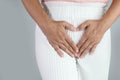 Asian women have problems with hidden spots, Have itching from vaginal discharge. Healthcare and medical concept