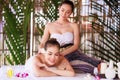 woman having massage in the spa salon, beauty, health care body skin natural herbs and essential oils treatment. concept Royalty Free Stock Photo