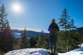 Asian women hiking in the snow at the Brocken mountain during winter in the Harz Germany