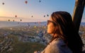 Asian women in hot air balloon during sunrise in Cappadocia Turkey, Kapadokya Goreme Royalty Free Stock Photo