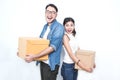 SME or freelance asian woman and man working with box