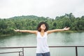 Asian women relax in the holiday. In the natural atmosphere, mountain forest