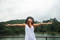 Asian women relax in the holiday. In the natural atmosphere, mountain forest