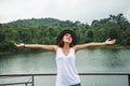 Asian women relax in the holiday. In the natural atmosphere, mountain forest