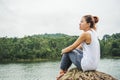 Asian women relax in the holiday. In the natural atmosphere, mountain forest