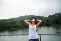 Asian women relax in the holiday. In the natural atmosphere, mountain forest