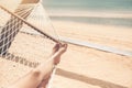 Asian women relaxing in hammock summer holiday on beach Royalty Free Stock Photo