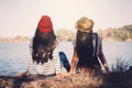 Asian women sitting on rock in nature Royalty Free Stock Photo