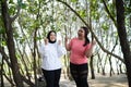 asian women sportswear standing with fist pump gesture