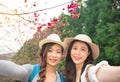 Asian women taking self portrait selfie photo Royalty Free Stock Photo