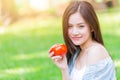 Asian Women with Tometo for healthy vegetable food high beta carotene vitamin for good health skin concept