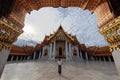 Asian women tourist traveling at Wat Benchamabophit Benjamaborphit dusitvanaram or marble temple, Bangkok, Thailand, Traveler Royalty Free Stock Photo