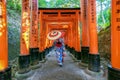 Asian women in traditional japanese kimonos at Fushimi Inari Shrine in Kyoto, Japan Royalty Free Stock Photo