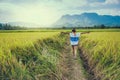 Asian women travel relax in the holiday. Stand natural touch mountain field. Thailand