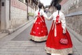 Asian woman traveler in traditional korean dress or hanbok dress Royalty Free Stock Photo