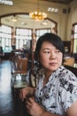 Asian women turn face in coffee shop vintage style