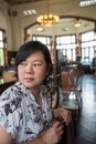 Asian women turn face in coffee shop vintage style