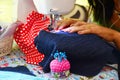 Asian women use machine sewing clothes