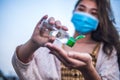 Asian women wear medical mask use antiseptic gel to protect Coronavirus or Covid-19 disease Royalty Free Stock Photo