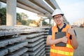 Asian worker showing thumb up at construction site Royalty Free Stock Photo