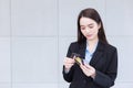 Asian working woman is choosing credit cards to use pay goods, it is a financial choice, easy pay Royalty Free Stock Photo