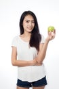 Asian youn woman healthy holding green apples