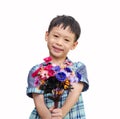 Asian young boy with a bouquet of flowers Royalty Free Stock Photo