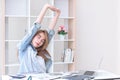 Asian young business women stretching hands in office Royalty Free Stock Photo